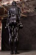 Yx In A Tight Rubber Catsuit, Tight Straps, Thick Collar, Rubber Mittens And Two ...