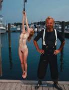 This Girl Is Hanged By Her Hands At The Harbor To Scare Other Girls Who Try To Escape ...