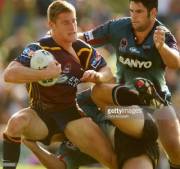 Brent Tate Of The Brisbane Broncos Is Tackled By Two Penrith Panthers Players (Sydney, ...