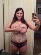 Younger Wife Stuffed In A Tight Corset Covers Her Nipples To Keep The Picture She's ...