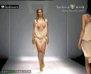 Sexy Model's Amazing Boobs Break Free From Her Outfit On The Runway [Gif]