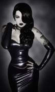 Pretty Tattooed Brunette With A Black Latex Outfit: Long Skirt, Bustier And Fingerless ...