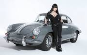 Hitomi Tanaka With Silver, Old-School European Car. (Sexy Homage To James Bond Films)