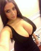 Stunning Raven-Haired Selfie Showing Off Her Little Black Dress And Not-So-Little ...