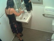 Chick caught showing off in public restroom